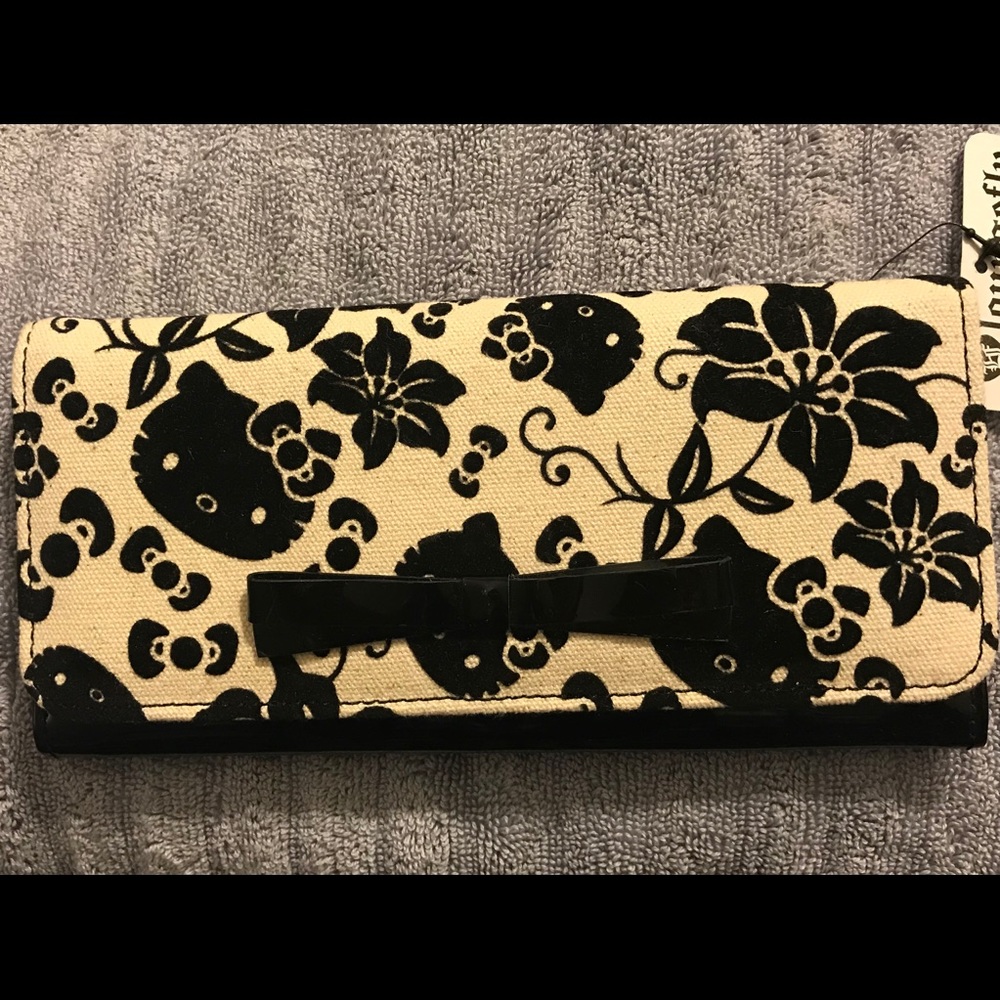 Black and white Hello Kitty wallet.